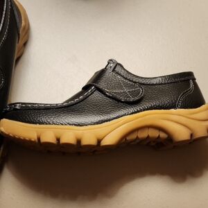 Women's Black Leather Slip-On Casual Shoe with Gum Sole